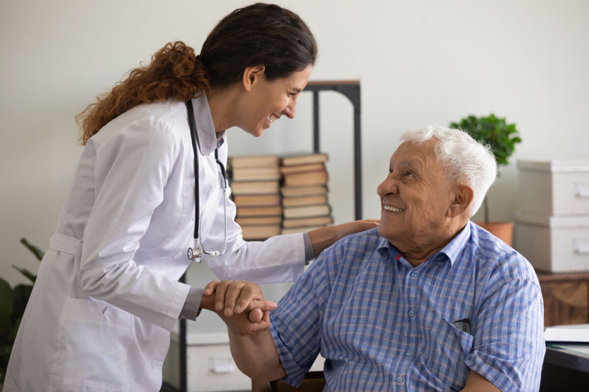 Older man with carer